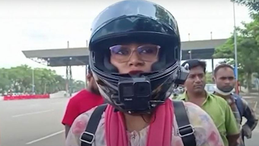 মাওয়া প্রান্তে পদ্মা সেতু পাড়ি দেওয়া প্রথম নারী বাইকার রুবা